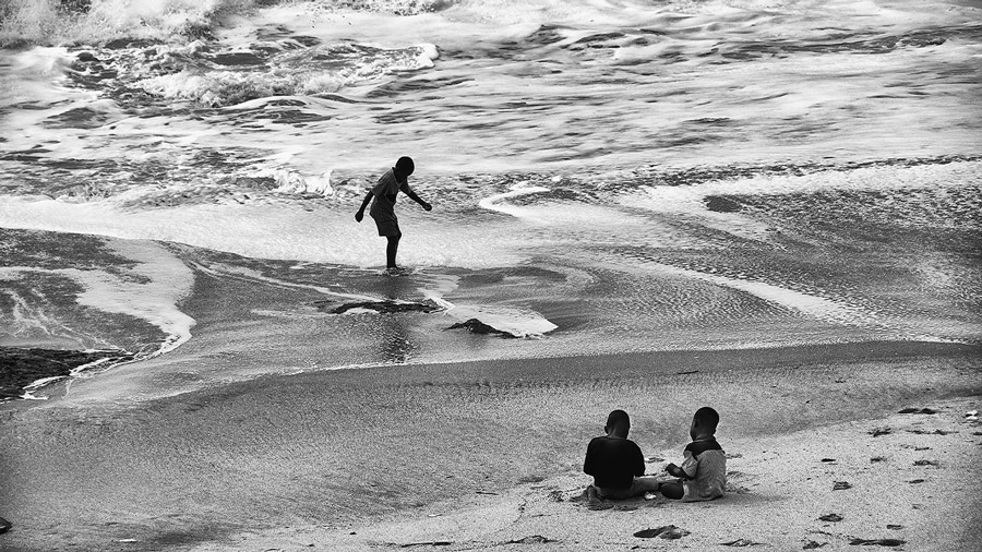 Kids Playing on Beach and in the ocean
