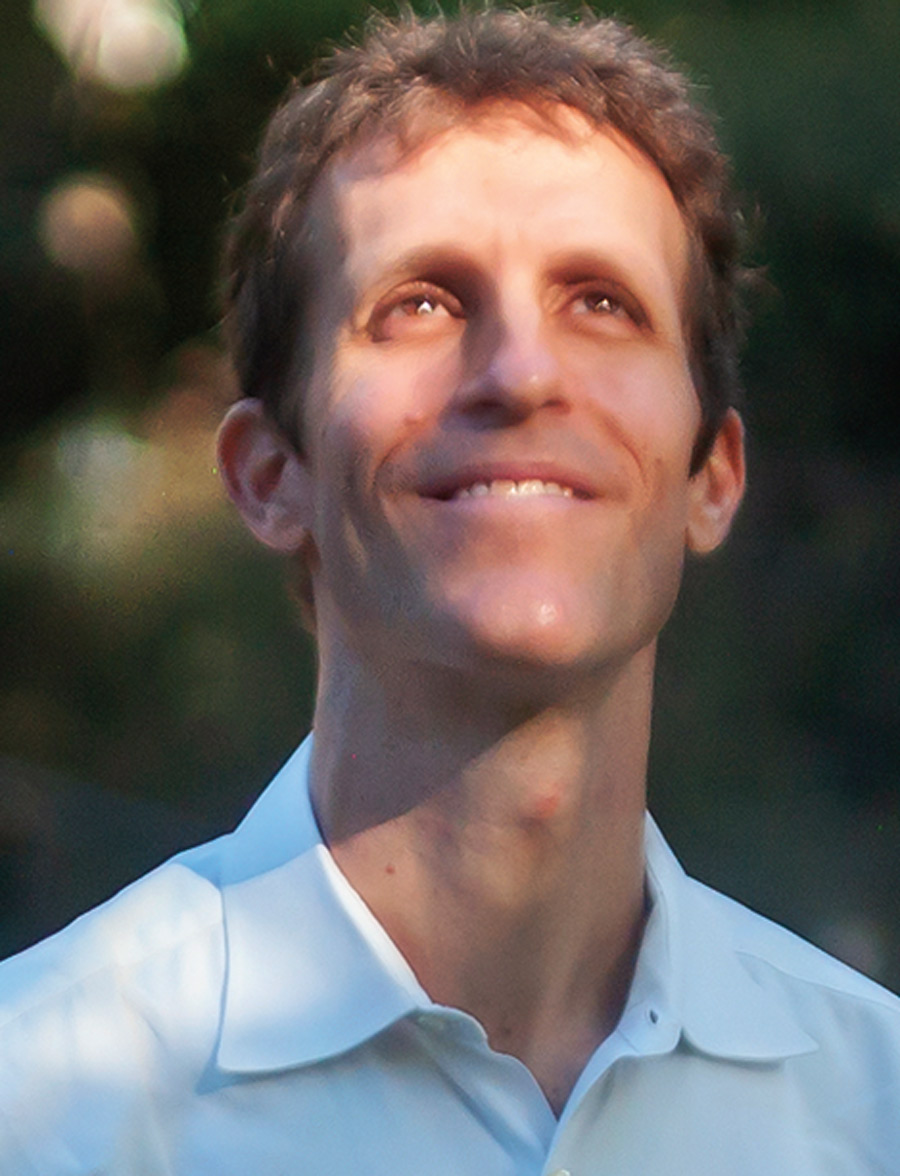 Closeup of Michael Ramberg, smiling and looking upward