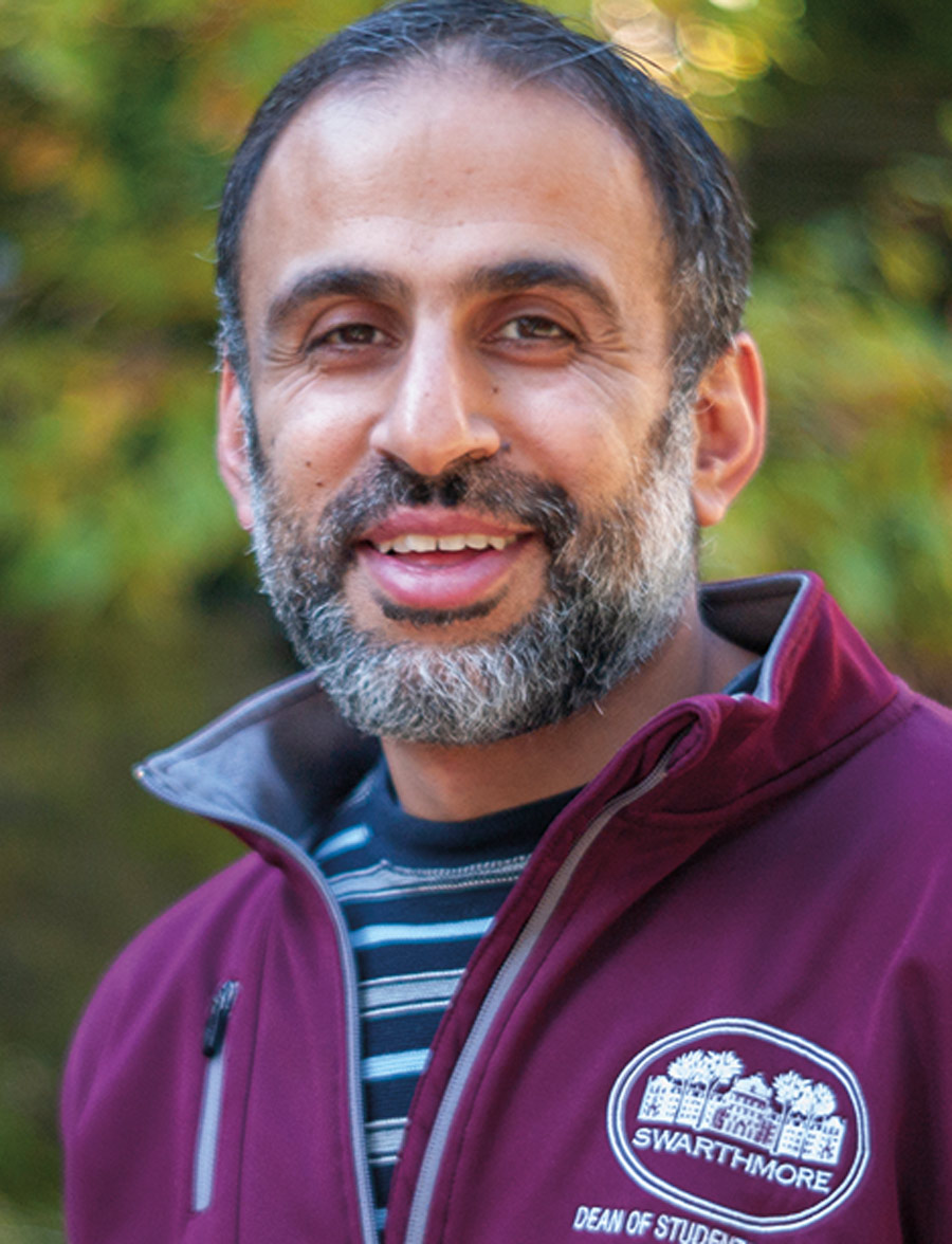 Closeup of Umar Abdul Rahman, smiling and wearing a garnet Swarthmore jacket
