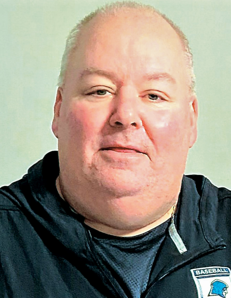 Headshot of Joe Phillips wearing a dark jacket.