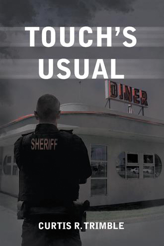 A man with "sheriff" written on the back of his uniform stands facing away from camera, towards a diner.