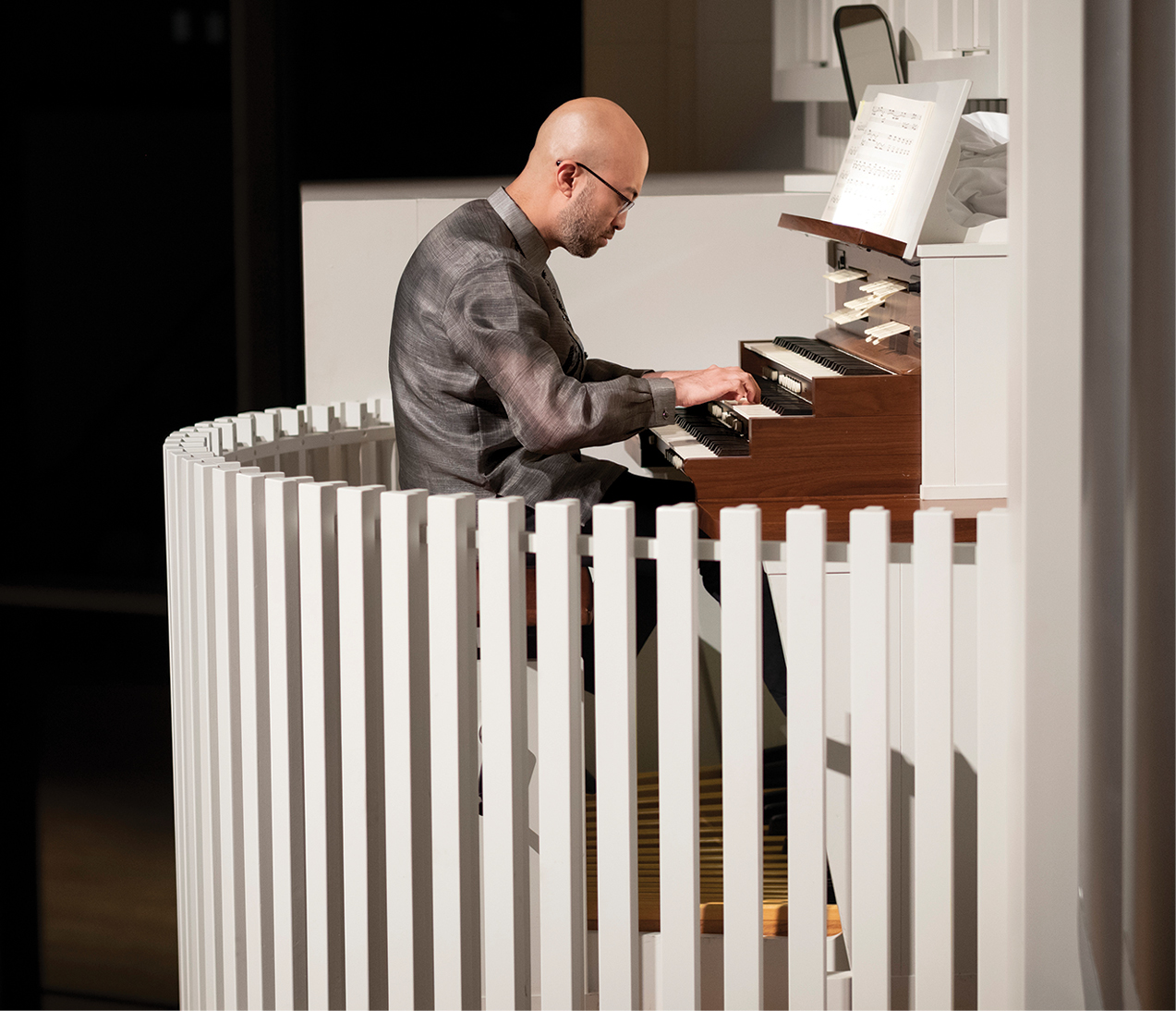 Mark Loria '08 plays the new organ.