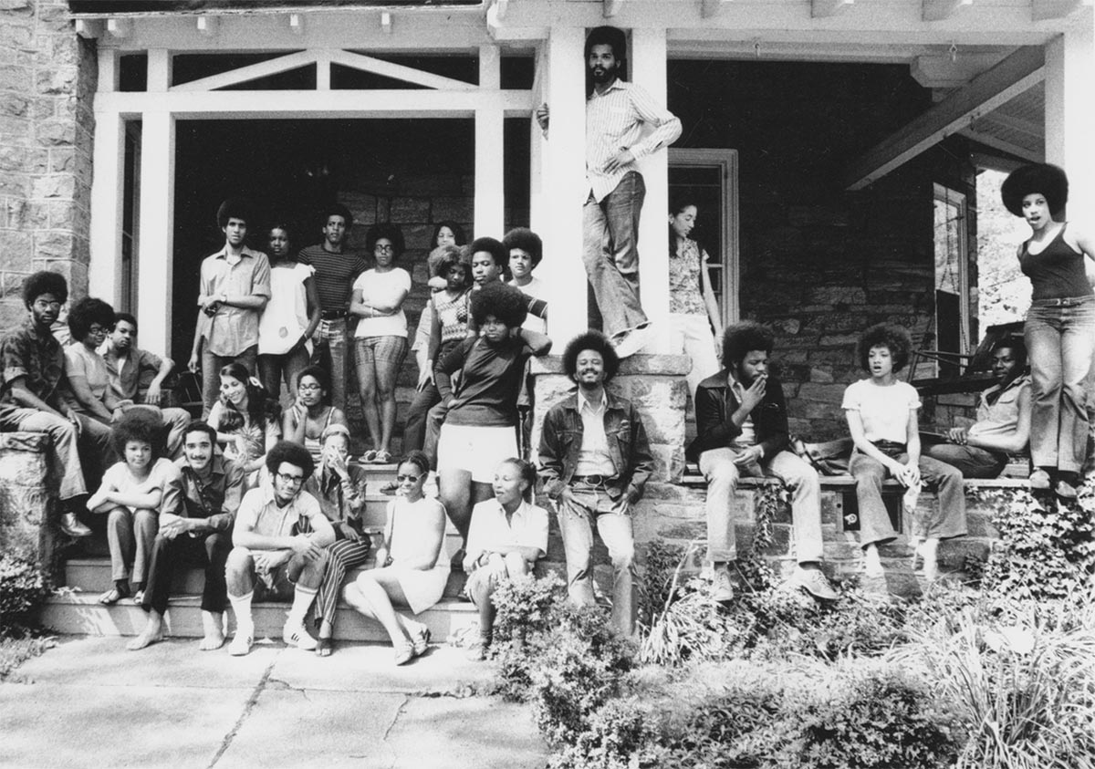 Students pose for a photo on the steps of the Black Cultural Center in the early 1970s