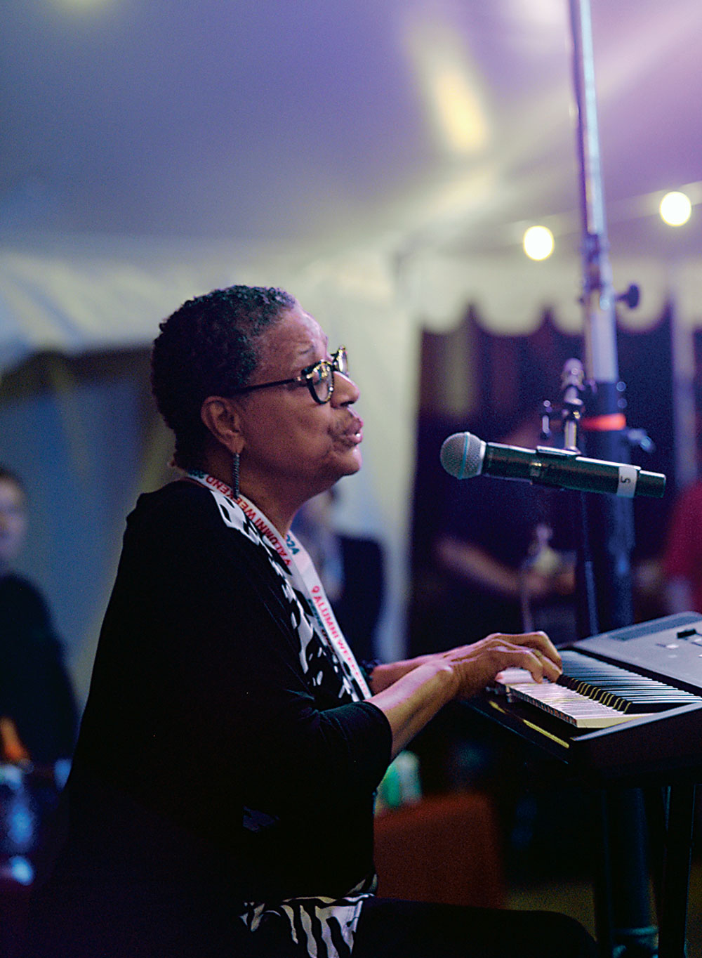 Vaneese Thomas '74, H '14 plays the piano and sings.