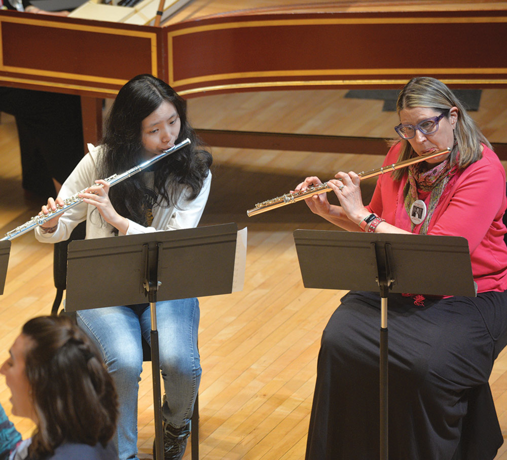 Two flute players.