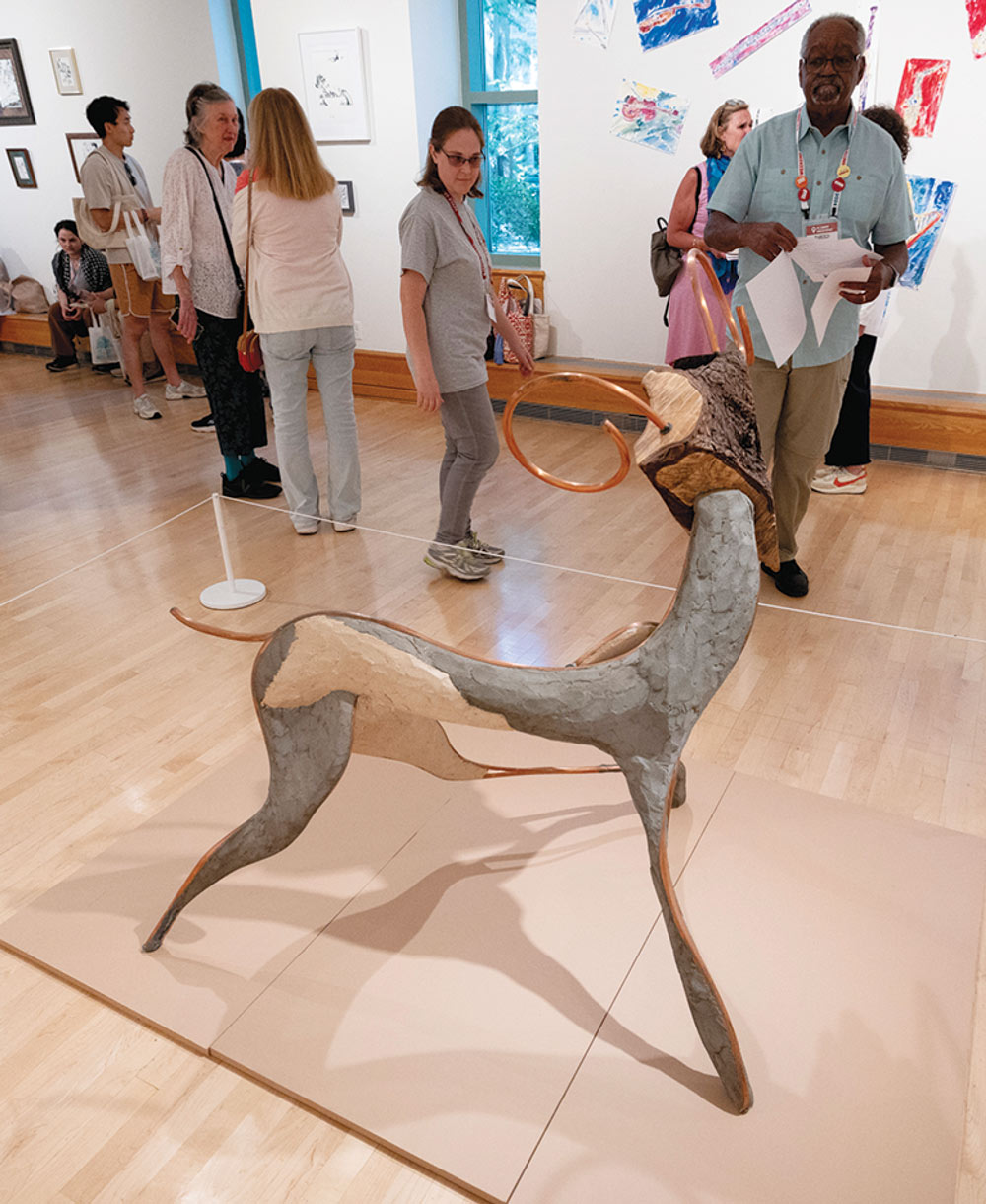 A sculpture in the shape of a deer with antlers.