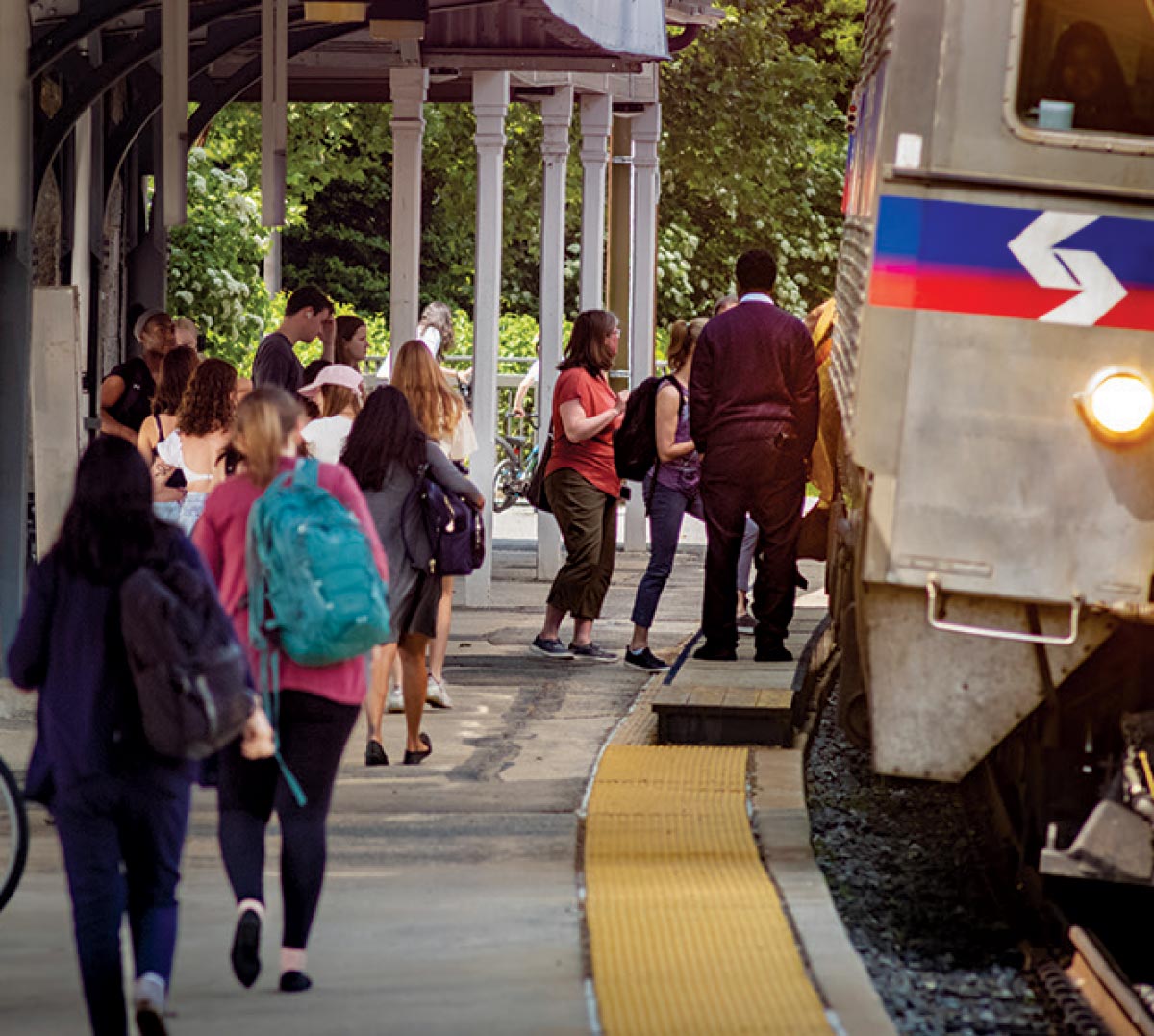 Passengers board the Regional Rail at SEPTA's Swarthmore stop.