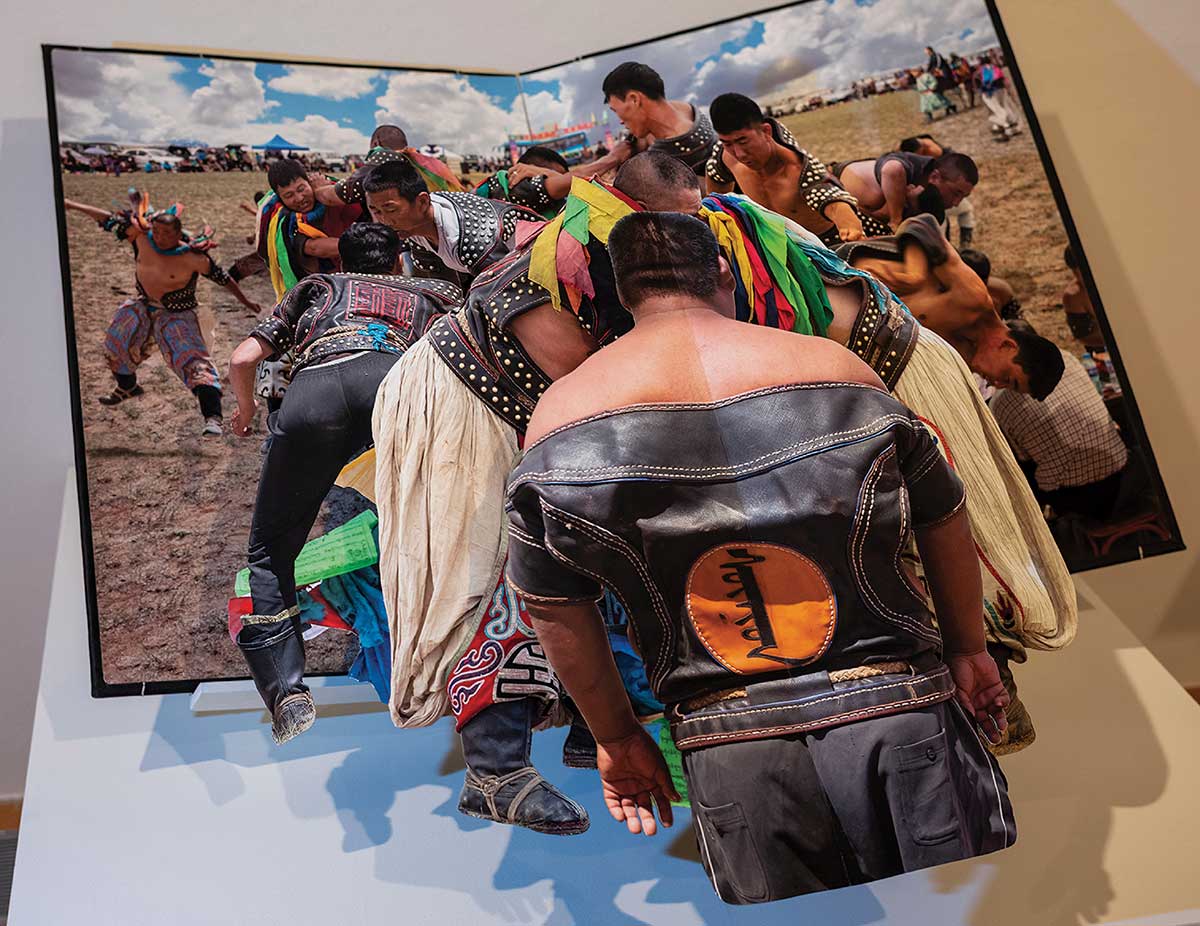 One of Collette Fu’s pop-up books, depicting a cultural gathering through photographs.