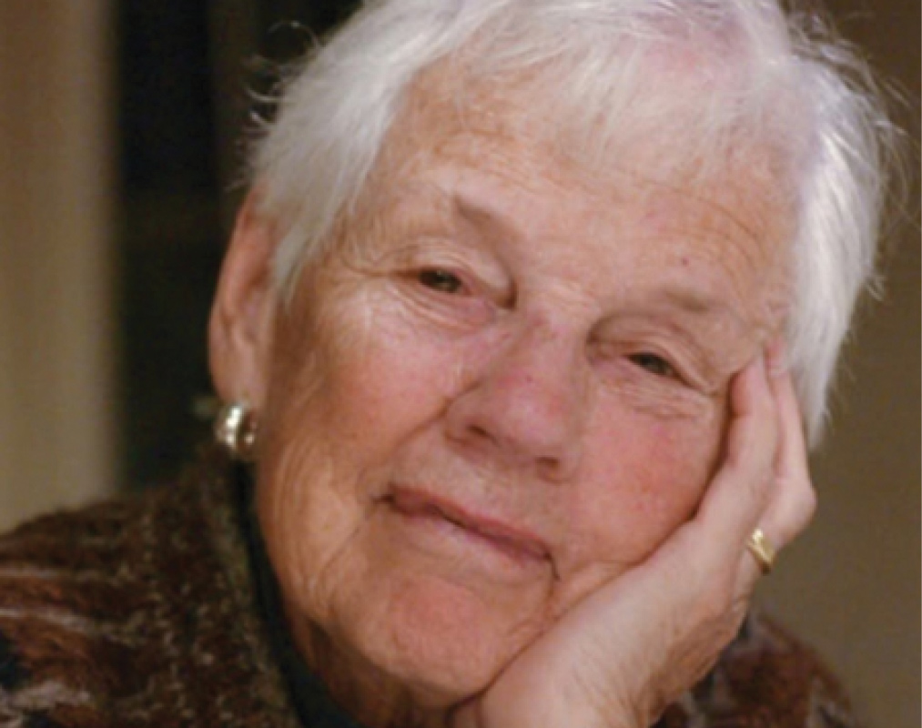 Sylvia Peters Agler '47 rests her head on her hand.