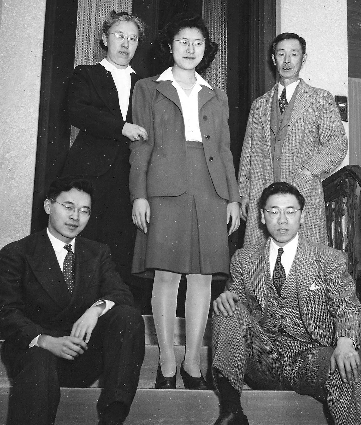 Black and white photo of the Inouye family in suits and dresses. Probably taken in the 1940s.